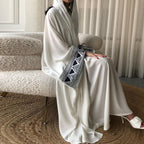 Robe longue noire musulmane pour femme avec ornements