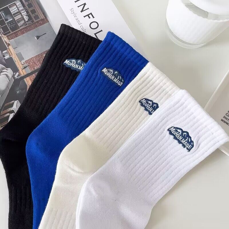Chaussettes de sport épaisses en coton pour hommes, idéales pour l'automne et l'hiver.