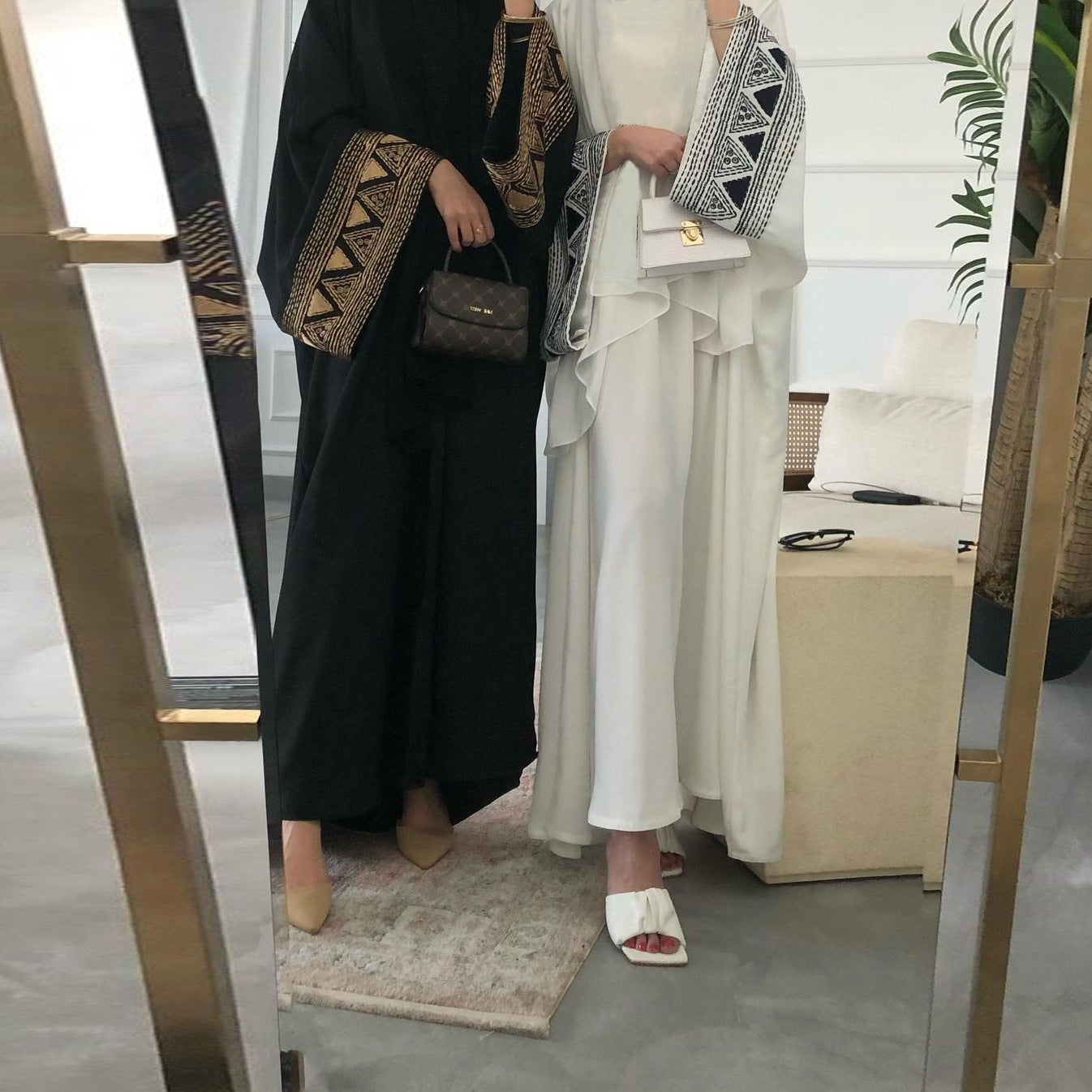Robe longue noire musulmane pour femme avec ornements