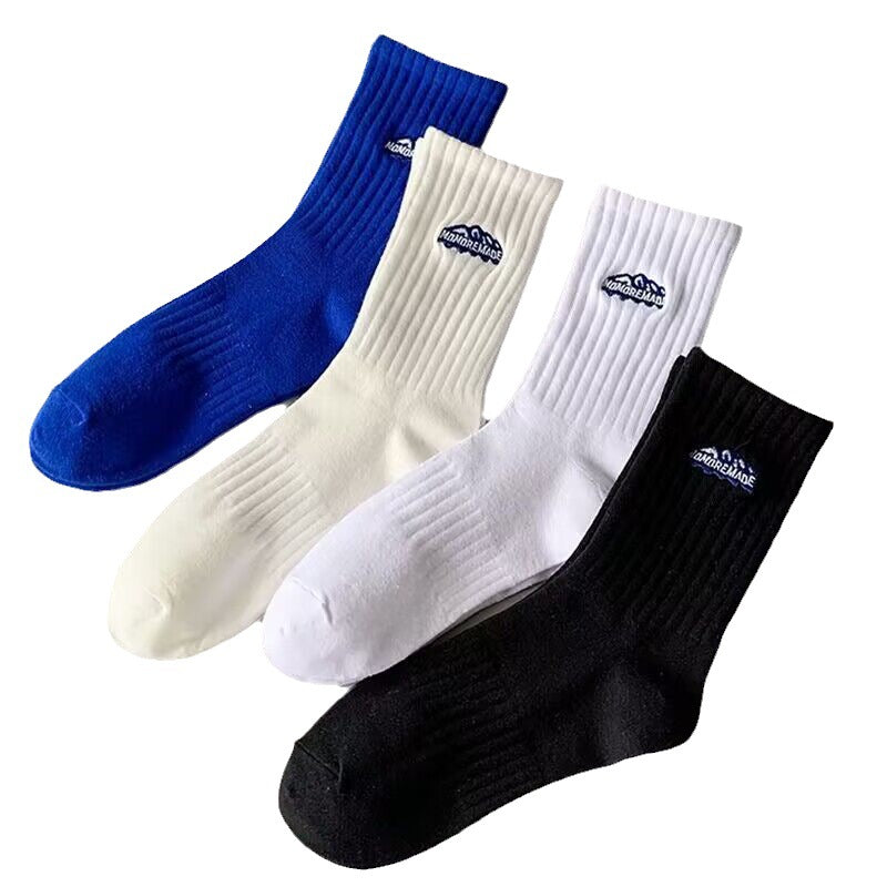 Chaussettes de sport épaisses en coton pour hommes, idéales pour l'automne et l'hiver.