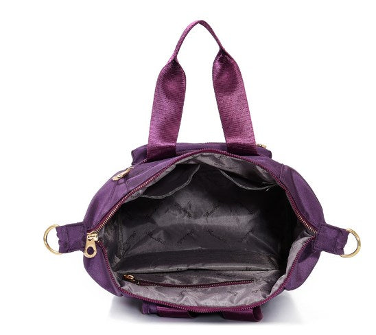 Sac à dos pour femme, grande capacité, léger et imperméable, en nylon.