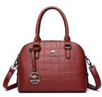 Sac à dos en cuir de crocodile avec double bretelle
