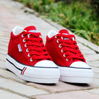 Chaussures blanches basses en toile à semelle muffin pour femmes