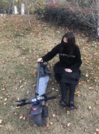 Scooter pliable