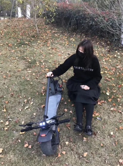 Scooter pliable