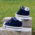 Chaussures blanches basses en toile à semelle muffin pour femmes