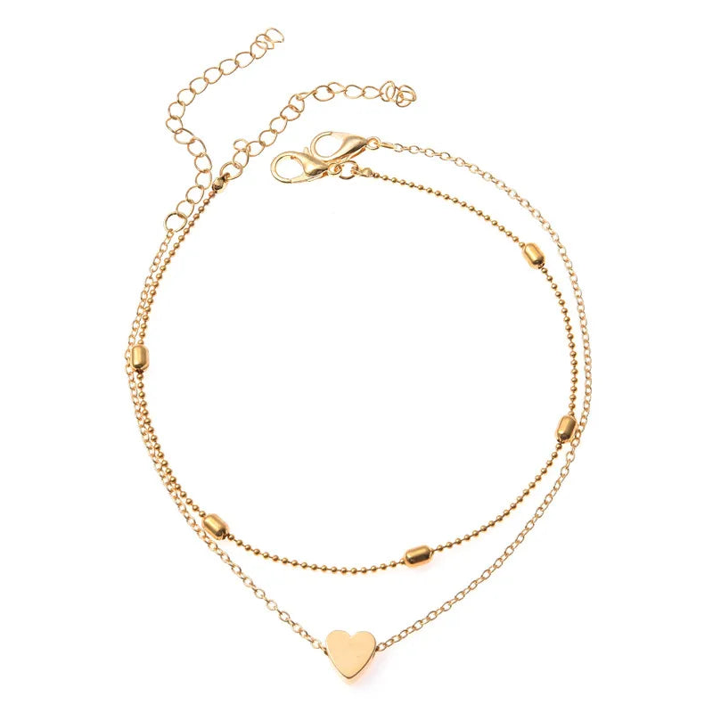 Bracelet de cheville tendance à perles multicouches en forme de cœur pour l'été, style bohème vintage.