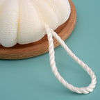 Boules de bain en maille douce pour un gommage exfoliant sous la douche