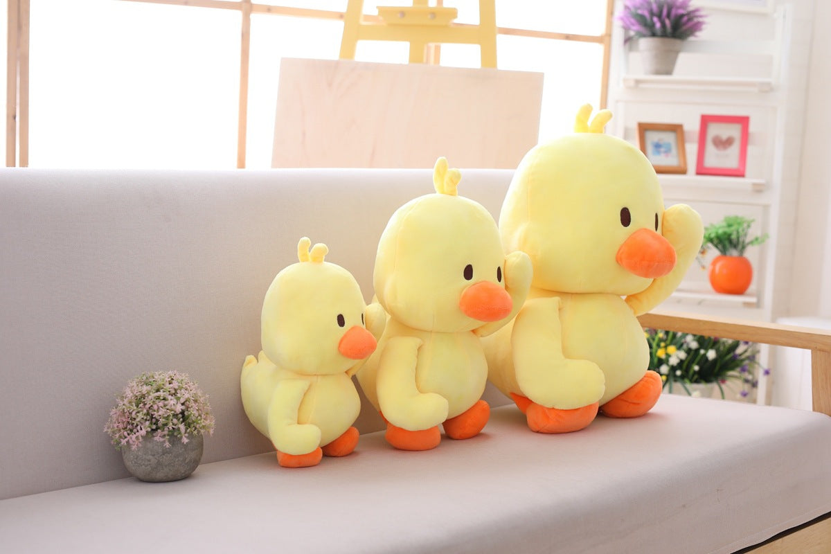 Canard en peluche jaune dansant avec expressions