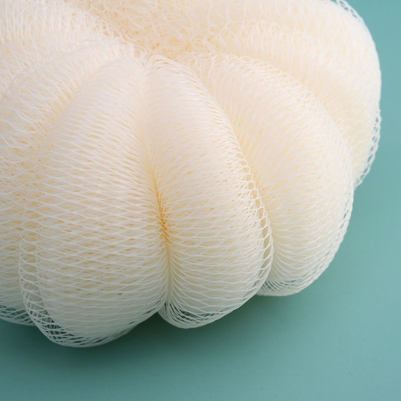 Boules de bain en maille douce pour un gommage exfoliant sous la douche