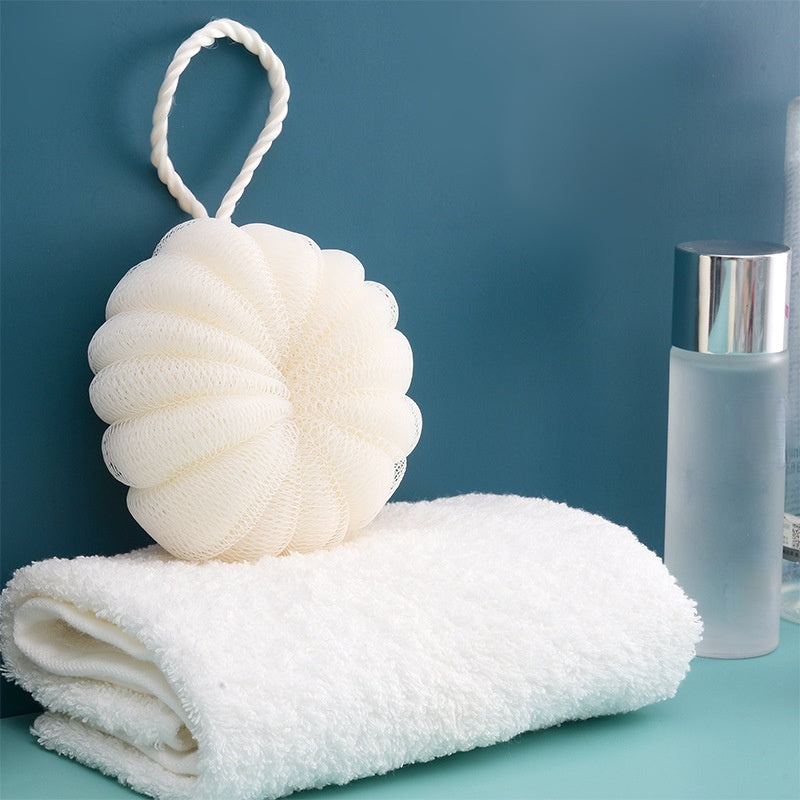 Boules de bain en maille douce pour un gommage exfoliant sous la douche